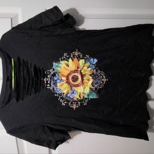 Black sunfower shirt with ripped detail on chest